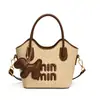 Bolso Transfronterizo 2026 Nuevo Estilo Tejido de Paja Moda Bolso Cubo para Mujer, Bolso de Hombro de Comercio Exterior de Gama Alta, Bolso Cruzado para Vacaciones