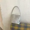 Bolso de mano de gran capacidad para mujer, nuevo modelo 2026, de un solo hombro, ligero, de alta gama, lujo discreto, de nicho, adecuado para ir al trabajo y a la escuela