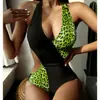 Traje de baño de una pieza con estampado de leopardo, escote halter y corte para mujer 2026, estilo europeo y americano, bikini triangular sexy sin espalda