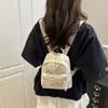 Mini mochila casual transfronteriza para mujer, nuevo estilo 2026, diseño moderno y simple, adecuada para viajes y salidas, hecha de tela de pana