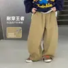 Pantalones largos de algodón puro para niños 2026 nuevo estilo de otoño, pantalones rectos holgados para niños mayores, pantalones casuales de pierna ancha para niños al por mayor