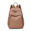 Mochila feminina 2026 novo estilo viagem tecido Oxford leve pequena mochila versátil moda lona estudante bolsa escolar