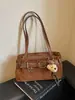 Bolso de hombro retro de diseño de nicho transfronterizo para mujer, nuevo modelo Otoño 2026, bolso de hombro de moda estilo coreano para commuting con textura