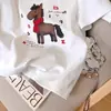 Camiseta de Manga Corta con Estampado de Letras de Pony de Dibujos Animados de Diseño Europeo para Mujer, Nueva Versátil de Cuello Redondo Primavera 2026