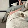 Juego de cuatro piezas de algodón de fibra larga de alta densidad y alta calidad para grado materno e infantil, cuatro estaciones, tacto de lujo ligero y alta gama, sábana, funda de edredón, juego de ropa de cama 4