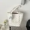 Bolso tote de lunares con un solo hombro de diseño único para mujer, nuevo modelo de verano 2026, gran capacidad, bolso con cremallera para el trabajo