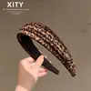 Diadema de moda Dongdaemun con estampado de leopardo, estilo coreano, diadema de alta cobertura para peinar el cabello, un accesorio de alta gama y versátil para salidas