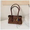 Bolsa tote retrô de cor sólida de grande capacidade estilo coreano, novo modelo 2026, simples e fashion, adequada para o trabalho e para ir ao trabalho, bolsa de ombro moderna