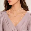 Joyería transfronteriza europea y americana Barroco multicapa cadena de agujeros pequeños collar con colgante de perlas para mujer collar de estilo hada ancla ins