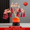 Piezas decorativas temáticas de caqui para 2026, creando una atmósfera festiva para una inauguración de casa, con flores artificiales creativas para exhibir en el mueble de TV de la sala de estar