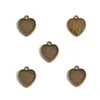 Colgante de aleación con forma de corazón para manualidades Accesorios de joyería Colgante Collar con cuentas Pulsera Corazón de melocotón hueco retro Forma de corazón A74