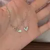 Collar de corazón de plata de ley s925 con diamantes completos, mini exquisito japonés de lujo ligero, cadena para la clavícula de diseño versátil para el día a día