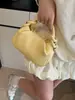 Bolso de mano vertical a rayas texturizado transfronterizo para mujer, nuevo modelo 2025, diseño de nicho, elegante y versátil, de hombro y cruzado, al por mayor