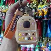 Bolsa de monedas popular de Capibara Llavero Cabeza de silicona Bolsa de almacenamiento para auriculares Bolso colgante Accesorios Regalos pequeños Al por mayor