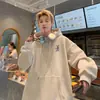 Moletom masculino de inverno com capuz e forro de fleece, espessado para aquecimento extra, novo estilo 2026, agasalho pesado moderno para adolescentes