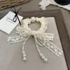 Modelo Nuevo 2025 Scrunchie de Satén Elegante Estilo Coreano para el Cabello para Mujeres, Accesorio de Moda Versátil