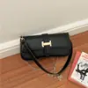 Bolso cuadrado pequeño de diseño de nicho francés para mujer, estilo coreano simple, versátil para ir al trabajo, bandolera, sensación de alta gama, de un solo hombro, bajo el brazo, bolso baguette