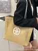 Bolsa de Palha Tecida Feminina Grande Capacidade 2025 Nova Bolsa para Sogra Bolsa de Ombro Praia Bolsa Tote de Alta Qualidade para o Dia a Dia