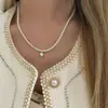 Collar de perlas de doble capa estilo retro francés para mujer, ligero, lujoso, de alta gama, con cadena para el cuello.