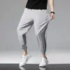 Pantalones Casuales de Seda de Hielo para Hombre Verano Ultra Delgados Transpirables Sueltos Talla Grande Estudiante Deportivos Marca de Moda Pantalones Leggings de Nueve Puntos de Secado Rápido