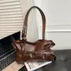 Nova bolsa de ombro feminina estilo coreano, moda de nicho, bolsa de axila de grande capacidade, bolsa tote versátil de alta qualidade para o dia a dia