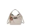 Bolso de mano de nicho estilo coreano para mujer, nueva colección de invierno 2026, bolso de hombro retro, adecuado para el trabajo y los desplazamientos, bolso tipo cubo
