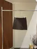 [Kaipu] Calça-saia metálica de couro com zíper lateral estilo francês Linhas Treze Outono versátil casual de alta qualidade meia saia BQA5200