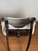 Otoño 2026 Bolso de Mano Retro de Nicho Elegante Nuevo Bolso Cuadrado Pequeño Personalidad para Mujer Gran Capacidad para Viajes Diarios Bolso de Hombro Único Cruzado
