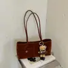 Bolso de Hombro Versátil de Felpa y Gamuza Retro de Moda 2026 Otoño Nuevo Diseño Simple para Viajes Diarios Bolso de Hombro Único