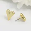 Pendientes versátiles de temperamento de alta gama estilo Hepburn de Instagram pendientes en forma de corazón pendientes de botón de corazón tridimensionales exquisitos a la moda simples