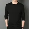 Camiseta masculina de manga comprida 2026 primavera e outono nova cor sólida gola redonda solta casual versátil base shirt camiseta masculina