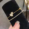 Estilo Lujo Ligero Europeo y Americano Pulsera Abierta de Doble Capa Cuadrada Calabaza con Lazo de Zirconia Joyería de Nicho Elegante de Alta Gama para Mujeres