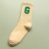 Calcetines de silicona personalizados de nuevo estilo, sin costuras, modernos, estándar G, de media pantorrilla para mujer, mismo estilo que en Little Red Book, color negro y blanco