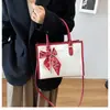 Bolsa de Mão Quadrada Pequena Color Block com Estampa de Cobra Fashion Atacado para Mulheres, Novo Estilo Primavera 2026, Bolsa de Ombro Único Transversal com Laço de Lenço de Seda