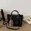 Bolsa Feminina Texturizada Vintage Nova 2026 Transfronteiriça Moda Tendência Simples Grande Capacidade Versátil Ombro Balde Transversal