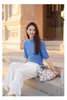 Suéter casual de lana para principios de otoño 2026, suéter nuevo y elegante de manga media para mujer Puyuan, hilo Yangzi, lavable a máquina, directo del fabricante