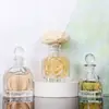 50ml botella de vidrio vacía regalo a mano estilo ins de moda 100g botella de miel botella de regalo de retorno de miel tapón de bola de vidrio para boda