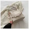 Bolsos Pequeños de Moda para Viajes Diarios para Mujer 2026 Nuevo Bolso Cruzado de Cadena de Gama Alta de Nicho Bolso Cubo de un Solo Hombro