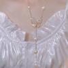 Explosiones de sonido al agitar collar de mariposa de diamantes diseño de nicho femenino Cadena para la clavícula con borla de perlas Cadena para el cuello de la red roja una generación de cabello
