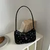 Nuevo bolso bandolera de estilo coreano de alta moda para principios de otoño de 2026, bolso de hombro elegante, bolso simple para el antebrazo para el día a día, bolsos de mujer al por mayor