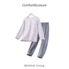 Conjunto de pijama de manga larga de color liso para niños y niñas, ropa de casa fina de cuello redondo, conjunto de dos piezas transpirable para niños mayores