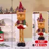 Decorações de Natal Novas Transfronteiriças Enfeites Telescópicos de Pé Xadrez de Natal Velho Homem Boneco de Neve Rena Boneca de Pernas Longas