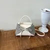 Bolso de axila de nicho de alta gama para mujer, nuevo bolso de hombro con lazo de verano 2026, bolso de mano moderno y versátil