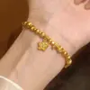 Pulseira Estrela Disco com Contas Marteladas Olho de Gato Banhada a Ouro Brilhante para Mulheres com Anel Corrente Correndo Cravejado de Diamantes e Fio Elástico