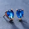 Deseo transfronterizo AliExpress moda viajero tres garras gota de agua piedra turmalina aretes huecos moda flash una generación de pelo