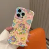 Funda para teléfono móvil con borde de flor de giro de agujero fino para Apple 16Promax tendencia 15 mar de flores 14 carcasa dura 12 hoja de arce 11