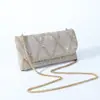 Nuevo bolso de mano de diamantes completo transfronterizo, un bolso de noche lujoso, un bolso de hombro con incrustaciones de diamantes, un bolso cruzado y un bolso de axila para eventos nocturnos