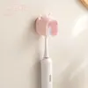 XinzaoNuevo modelo de portacepillos de dientes con tapa, a prueba de polvo y drenaje de agua sin taladro, estante de pared para cepillos de dientes con forma de oso