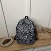 Mochila Transversal Versátil Unissex Estilosa Grande Capacidade Estampa de Leopardo Nova Outono 2026 para Estudantes Universitários