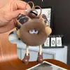 Lindo Estampado de Leopardo Lazo Pelo de Conejo Mini Pompón Llavero de Coche Colgante Bola de Felpa Decoración de Mochila Regalo